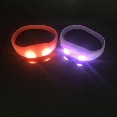 China Motion /sound activated RFID switch on/off control programmable remote controlled led bracelet led wristband for sale