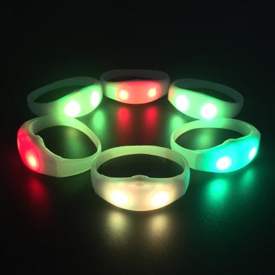 China Concert Party Events LED Colorful Flashing Wristbands Activated Lighting Sound Led Wristbands for sale