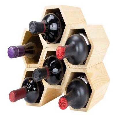 China Simple Yet Classy Natural Texture Sustainable Wall Mounted 6 Bottles Display Storage Best Selling Hexagon Wood Wine Rack for sale