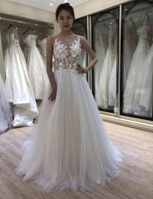 China 2021 Anti-Static A Line Tulle Wedding Dress Sleeveless Soft Bateau Neck Sweep Train for sale