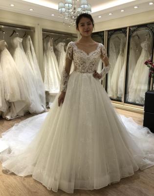 China 2021 Breathable Long Sleeve Wedding Dress Elegant Chapel Train Ball Gown Wedding Dress for sale