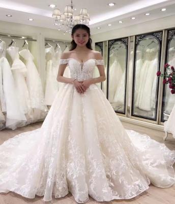 China 2021 Breathable Off The Shoulder Chapel Train Luxury Lace Wedding Dress Ball Gown Arabic Princess Dress for sale