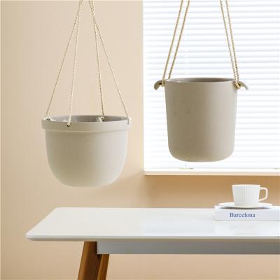 China Modern European Style Novelty Minimalist Design Floating Ceramic Flower Pot Hanging Planter for sale