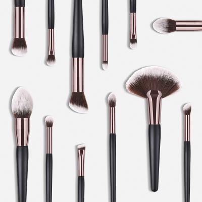 China Now Hot 12pcs Cruelty Free Synthetic Hair Make Up Brush Ergonomic Fan Shape Black Makeup Brush Set for sale