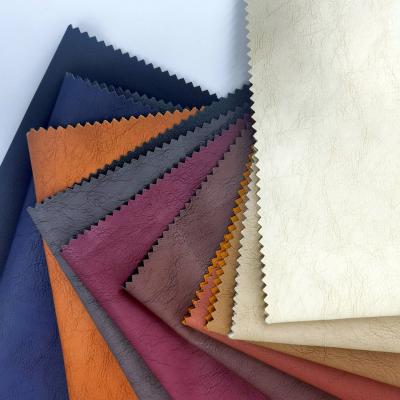 China Other Best Selling High Quality Litchi Green Leather Grain PU Fashion Leatherette Fabric for sale