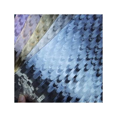 China Other Newly Developed Peacock Dreamlike Metallic Film PU Embossed Leather For Shoes And Bags for sale