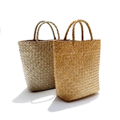 China New style viable multifunctional women's handmade woven handbag in primary color for sale