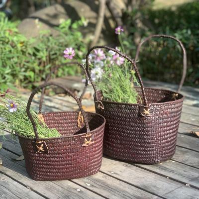 China Sustainable Flower Basket Decoration Ensures Small Straw Flower Baskets Woven Flower Basket Hanging for sale