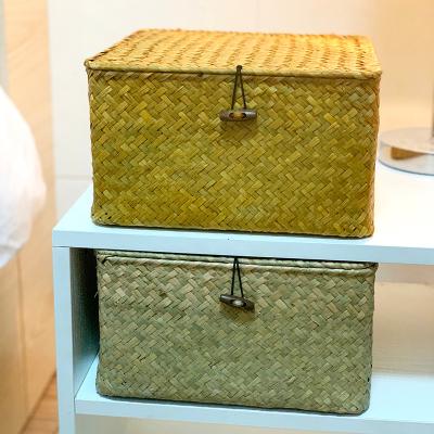 China Sustainable Handmade Woven Plant Plankton Rattan Storage Rectangular Basket For Shelf Organizer With Lid for sale