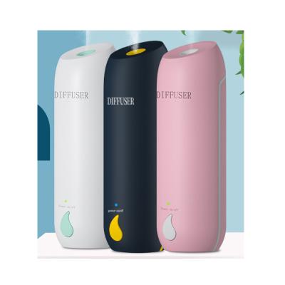 China Hotel Automatic Spray Scent Humidifier Fragrance Machine Toilet Bathroom Plus Smell Mode Air Purifier for sale