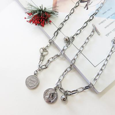 China Hot Selling Lead Free Nickel Free Vintage Cut Coin Necklace Chain Bracelet and T Heart Paperclip Necklace Pendant Set for sale