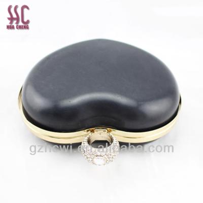 China Modern heart-shaped box purse frame, Guangzhou made box clutch, purse frame with plastic box for sale