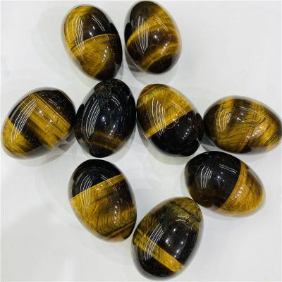 China China Crystal Eggs High Quality Natural Reiki Healing Gold Wholesale Tiger Eye Crystal Rough Stone for Decoration for sale