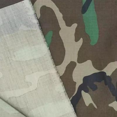 China Flame Retardant America 50/50 High Strength Nylon Cotton Camouflage Print Ripstop Fabric WR Military Function for sale