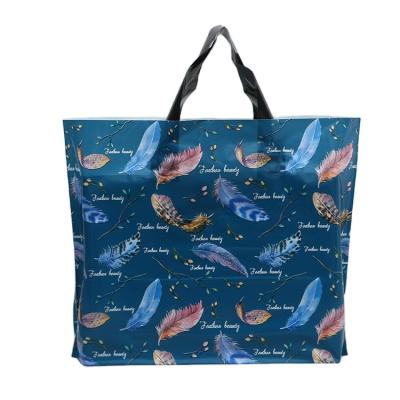 China PP Clothing Store Plastic Clothing Handbag Shopping Gift Bag PE Cartoon Customized Packaging Shopping Bags for sale