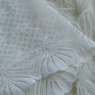 China Retro 23cm unilateral white high quality liturgical style elastic nylon lace fabric for women wedding dress for sale