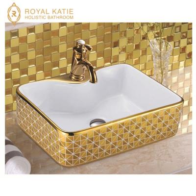 China Luxury Gold Sink Bathroom Sink Ceramic Oval Ceramic Basin Bathroom Sink for sale