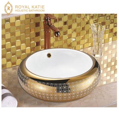 China Wash Basin Customized Bathroom Ceramic Luxury Gold Color Design Painted Gold Basin Price for sale