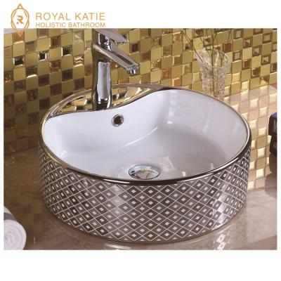 China Modern washbasin oval above counter basin electroplate gold color sink for sale