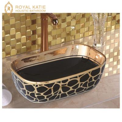 China 2018 Custom Lavatory Flower Art Basin Ceramic Gold Color Hand Wash Basin for sale