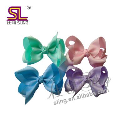 China Eco-friendly 8 inch wholesale jojo bows grosgrain hair bows for girls with hair clips for sale