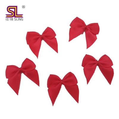 China Wholesale Small Floral Ribbon Bow Tie SPOOL High Quality Polyester for sale