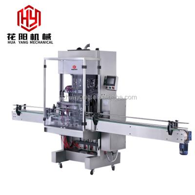 China QZ-T-F hotsale pneumatic liquid cosmetic filling machine for filling four heads in china huayang manufacture for sale