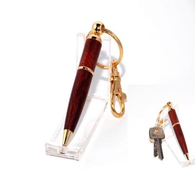 China Rosewood twist ball pen with golden key chain for sale