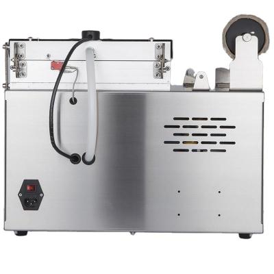 China DQ300VST Plastic Vertical Food Tray Vacuum Skin Sealing Biscuit Packing Machine for sale