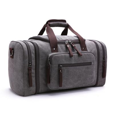 China 2022 New Vintage Large Capacity Outdoor Travel Increasing Duffel Bag Trend Casual Handheld Shoulder Duffel Bag Canvas Messenger Bag for sale