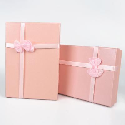 China Recycled Materials FocusBox Custom Printed Pink Lid And Bottom Bottom Gift Box Packing With Bow Tie Ribbon for sale