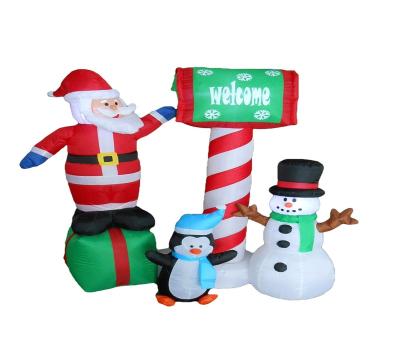 China Decoration 150cm/5ft festival inflatable santa claus sitting on a gift bag touching the mailbox with a penguin and a snowman in the front for sale