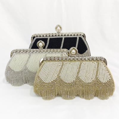 China Factory direct wholesale brand new classic beaded evening clutch crystal clutches events with tassels party bag for women prom banquet for sale