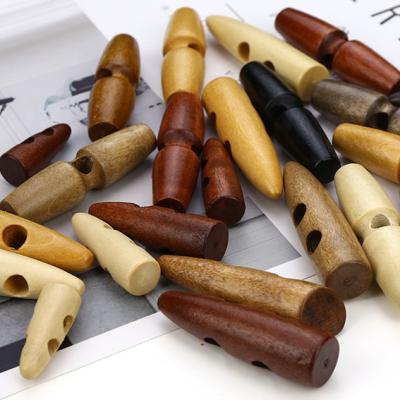 China Viable Custom Vintage Color Resin Material Natural Coat Sew Horn Toggle Sewing Button for sale