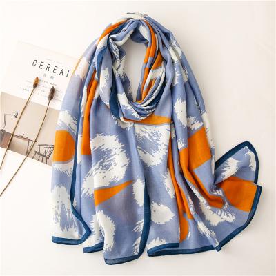 China Fashionable Blue Orange Thin Silver Lady Decoration Color Tangled Beach Scarf Basking in Cotton Feel Canvas Scarf for sale