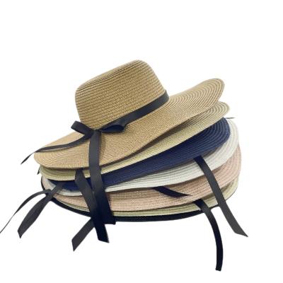 China Striped Classic Popular Women's Beach Outdoor Hat With Ribbon Bow 12cm Brim Black Windproof Straw Woven Hat Large for sale