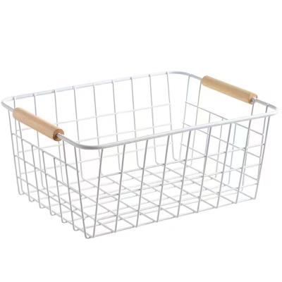 China Sustainable Modern Minimalist Nordic Style Wrought Iron Sundries Storage Basket With Wooden Handle for sale