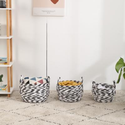 China Trendy Modern Black And White Striped Paper Braided Basket Stocked Rope Storage With Handle for sale