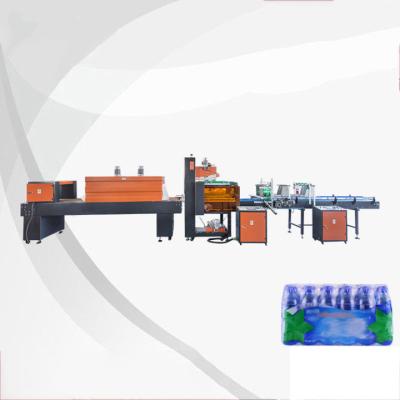 China Automatic Food Shrink Package Machine PE Shrink Paper Thermo Packing Machine With 15000 Bottles Filling for sale