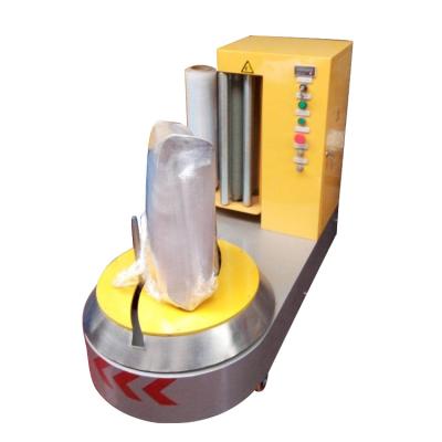 China Food Stretch Film Airport Goods Luggage Wrapping Packing Machine In Airport for sale