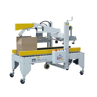 China CLOTHING OEM Factory Cardboard Sealing Case Flap Box Taping Machine for sale