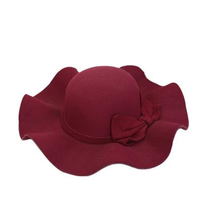 China High quality ladies wavy side big casual round hat color butterfly festival hot selling natural hat for sale