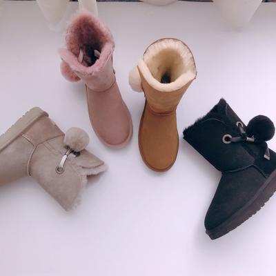 China Custom Warm Soft Cute Women Ball Hair Sheepskin Fur Outdoor Winter Snow Boots Round Real Decoration for sale