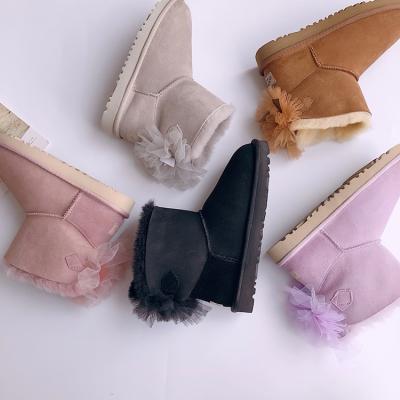 China Fashion Luxury Real Sheepskin Bow Winter Custom Warm Cute Ankle Round Snow Boots For Women for sale