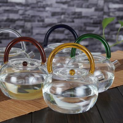 China Sustainable Custom Making 780ml Colored Glass Teapot With Creative Handle for sale