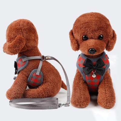 China Dog Running Walking Training Raising Soft New Bow Bell Pattern Dog Puppy Harness Cute Plaid Adjustable Leash Strap Wholesale for sale