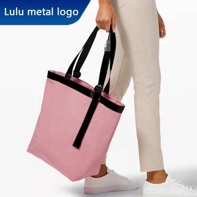 China Oxford Lulu border the same oblique yoga handbag large capacity travel straddle sandwich backpack shopping bag Tote Bag for sale