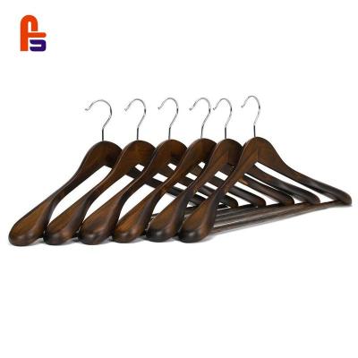 China Cedar Wood Hanger Black Hook Bohemian Wood Hanger For Clothing Customized Logo for sale