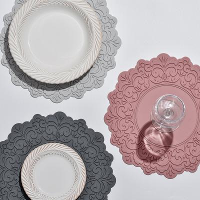 China Sustainable Plant BPA Free Waterproof Round Silicone Place Mats For Dining Table for sale