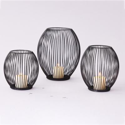 China Wholesale Romantic Black Metal Wire Iron Wire Cage Candlestick Holder Geometric Oval Candle Holders Set of 3 for sale